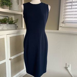 Calvin Klein Navy Dress with gold zipper detail.
